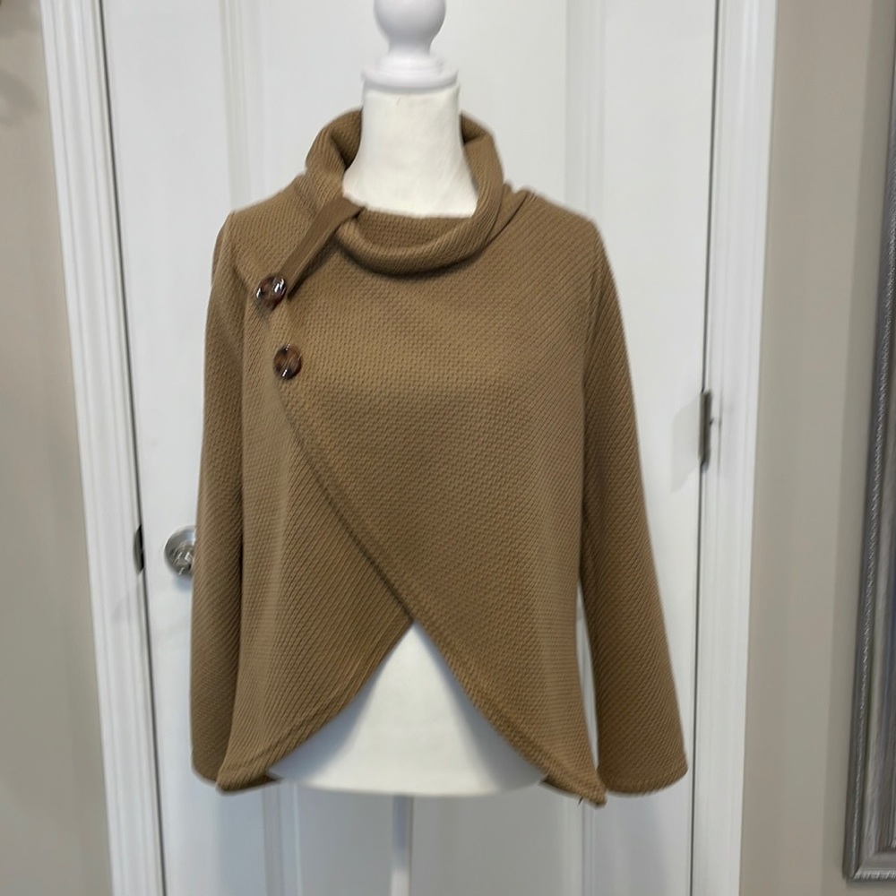New never worn - purchased on line - size is XL  - but more like a Medium